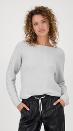 Sweater with decorative accents