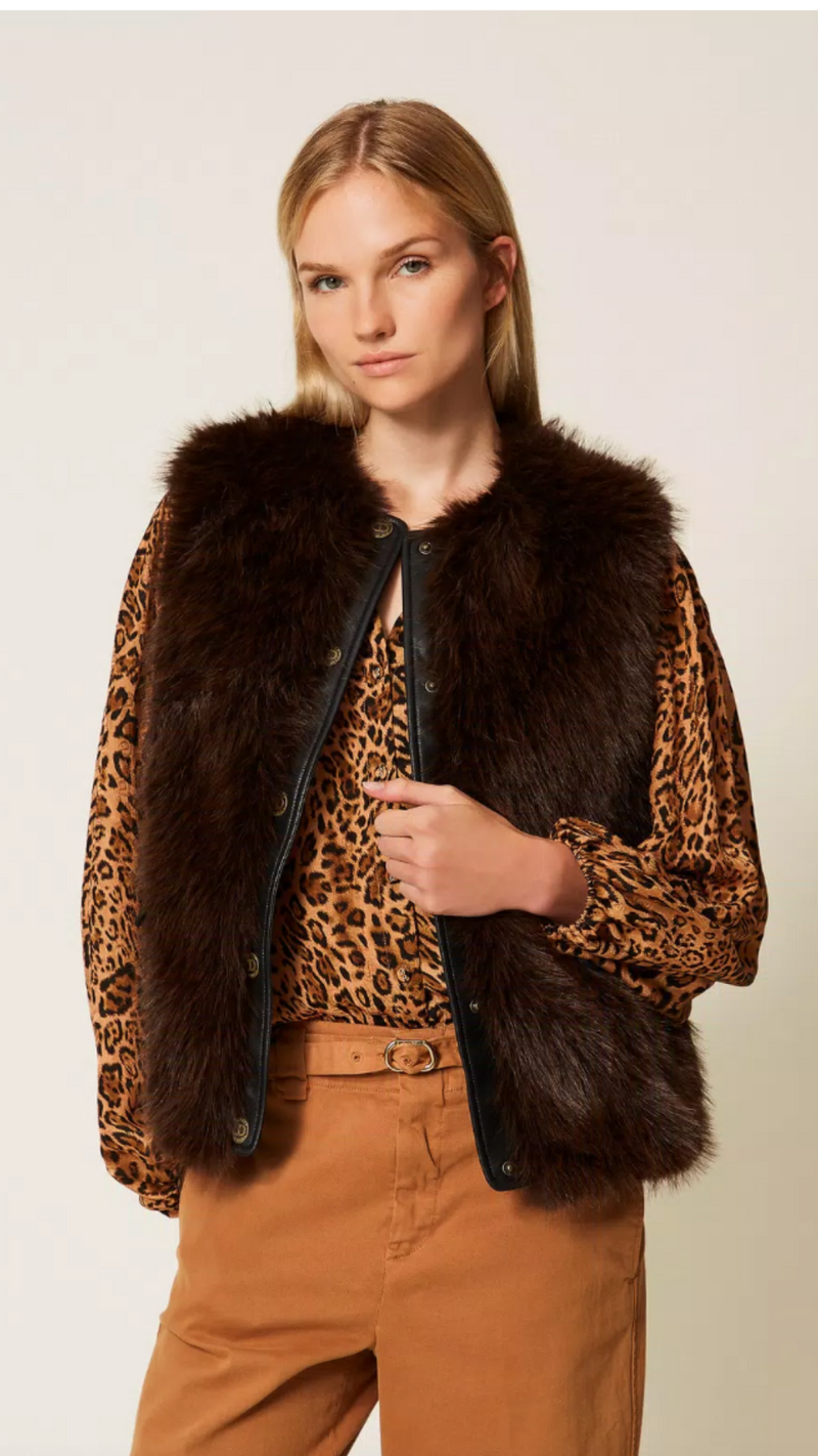 Sleeveless faux fur coat with buttons