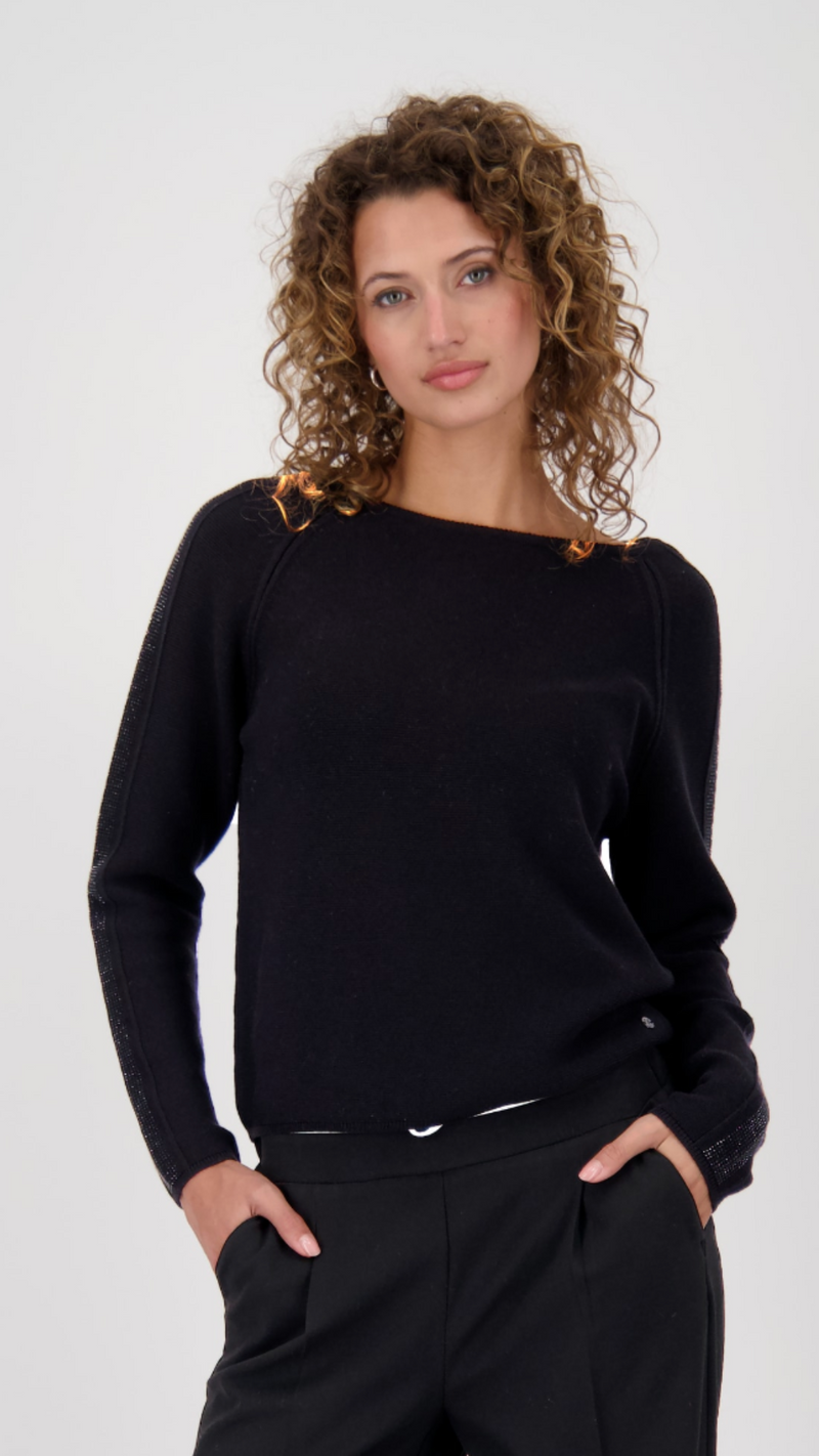 Sweater with decorative accents