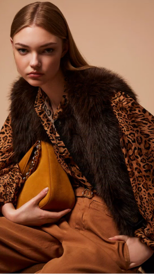 Sleeveless faux fur coat with buttons