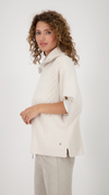 Knitted Cape with Cable Pattern
