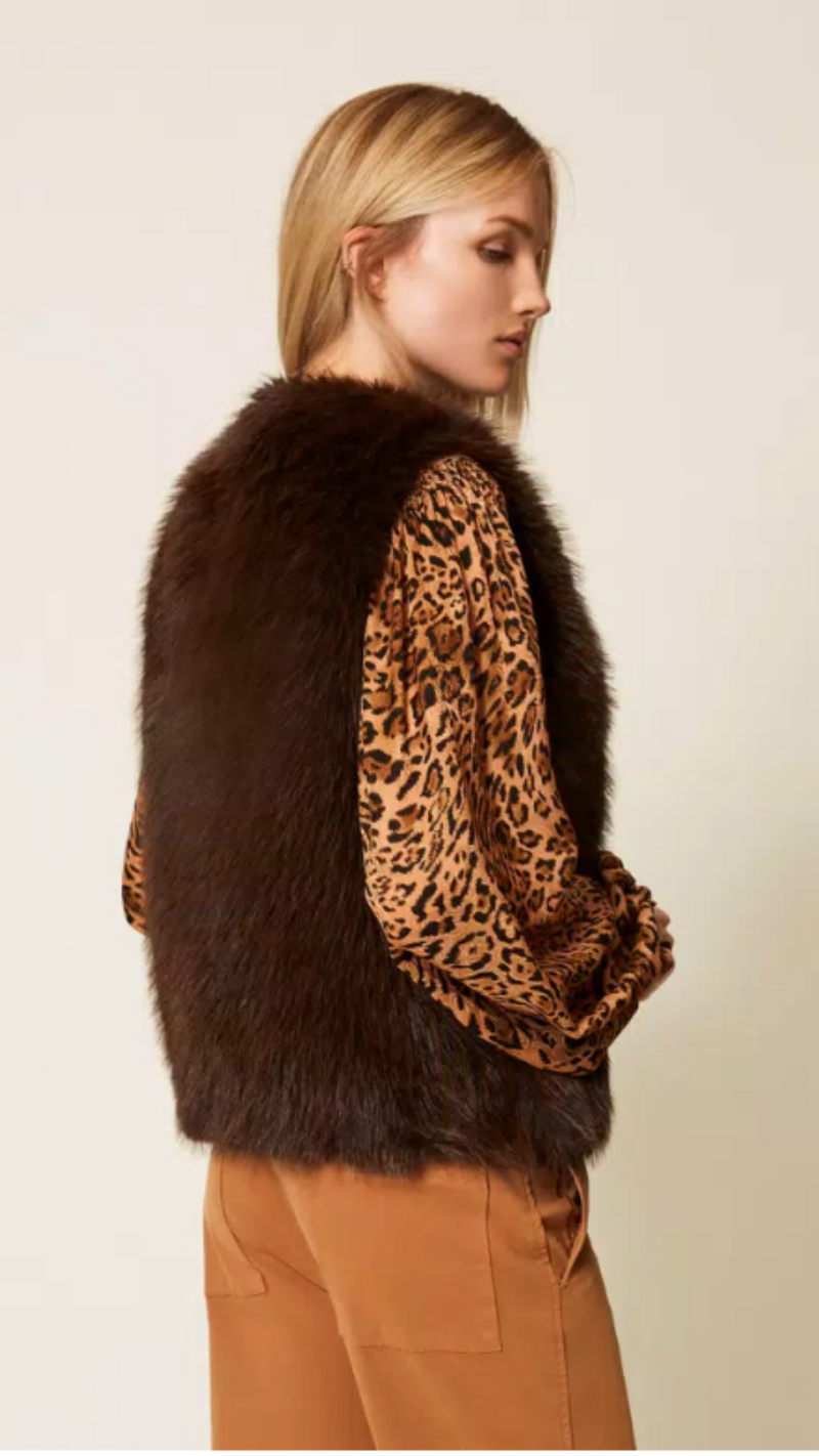 Sleeveless faux fur coat with buttons