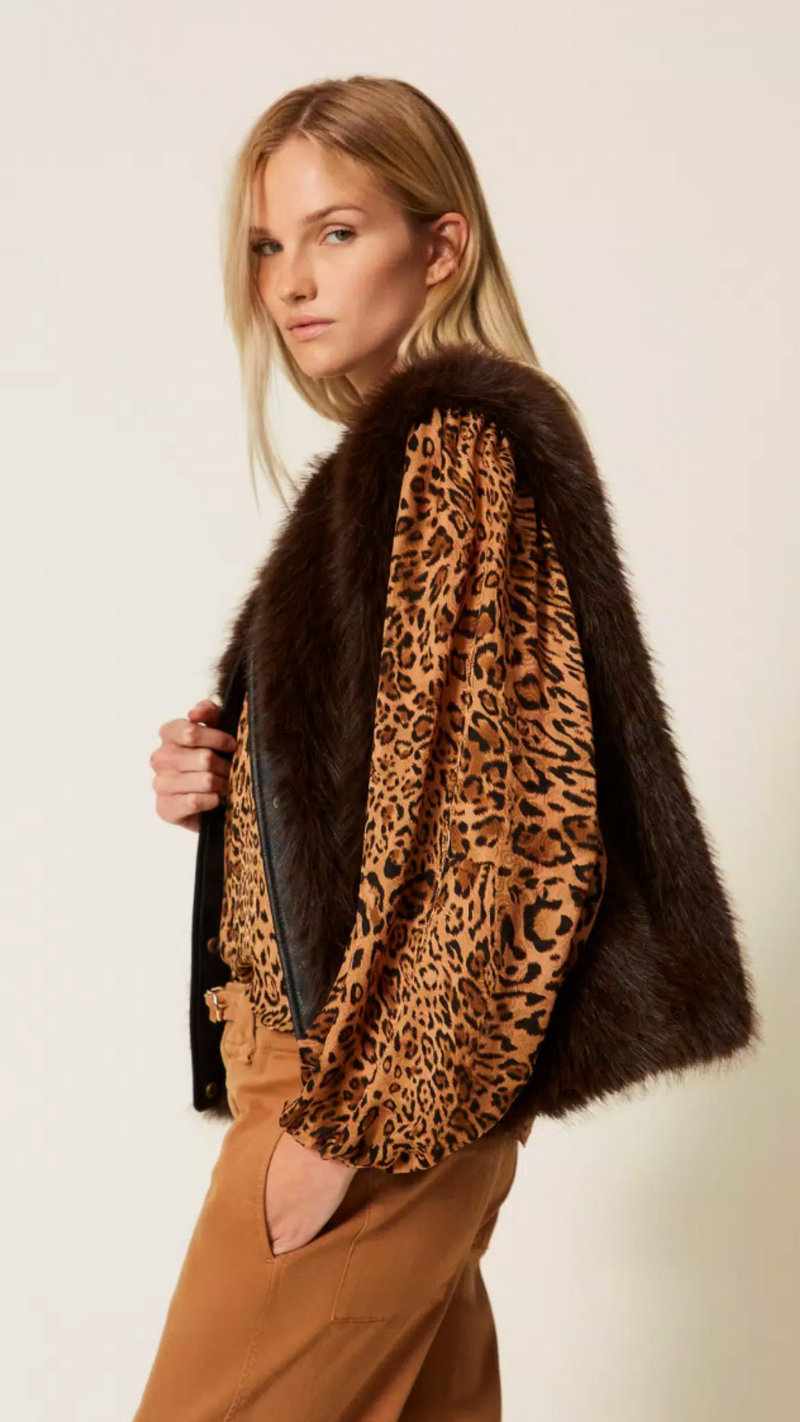 Sleeveless faux fur coat with buttons