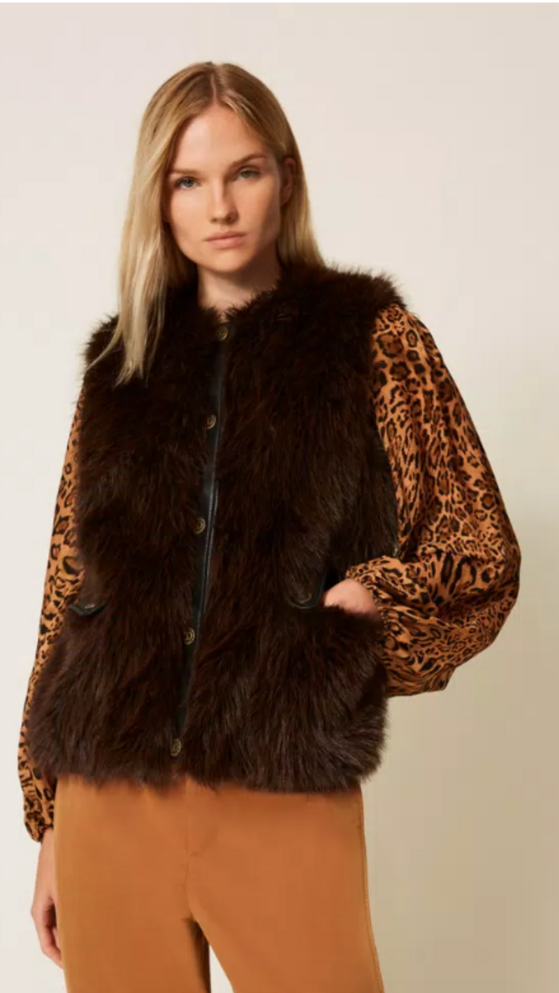 Sleeveless faux fur coat with buttons