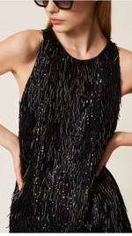 Short dress with sequin fringes