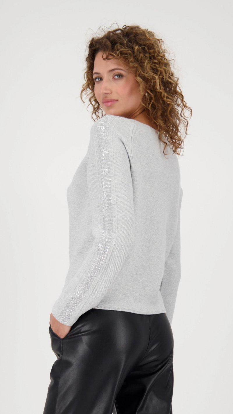 Sweater with decorative accents