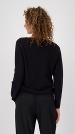 Sweater with decorative accents