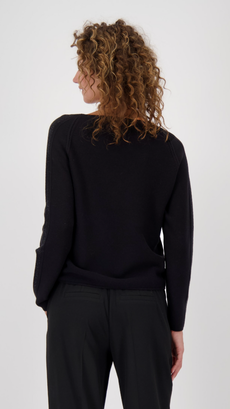 Sweater with decorative accents