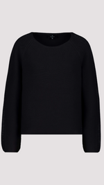 Sweater with decorative accents