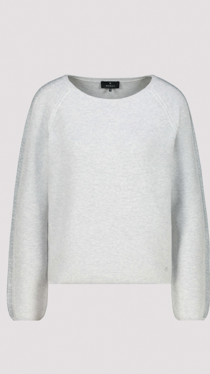 Sweater with decorative accents